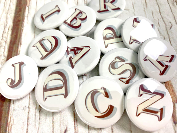 Alphabet Button Badges-Stirling Shadow Accessories, Badges, Font Not Found, Font: Stirling Shadow 44ideas.co.uk