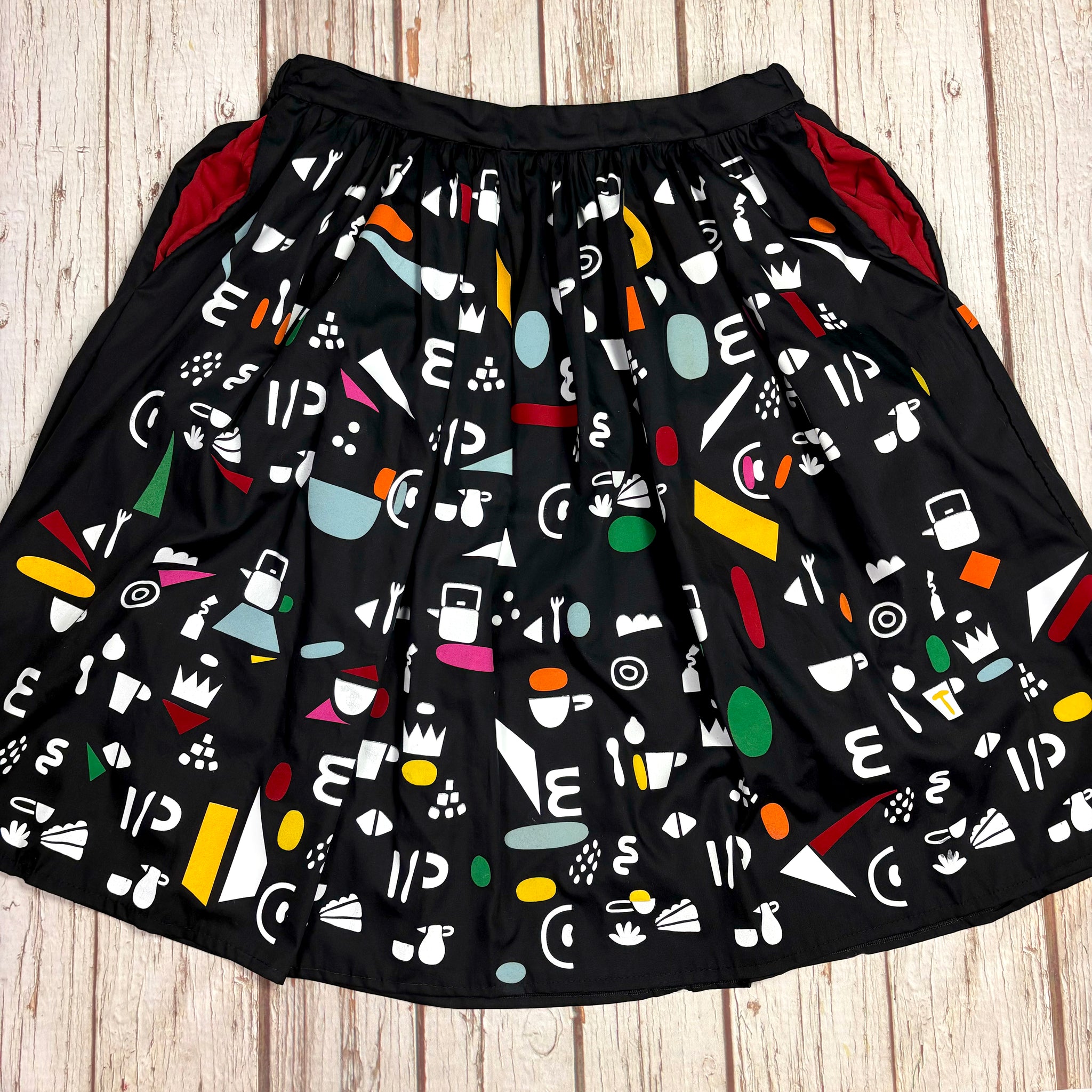 Black 'tea at Eleven' midi Skirt with Pockets