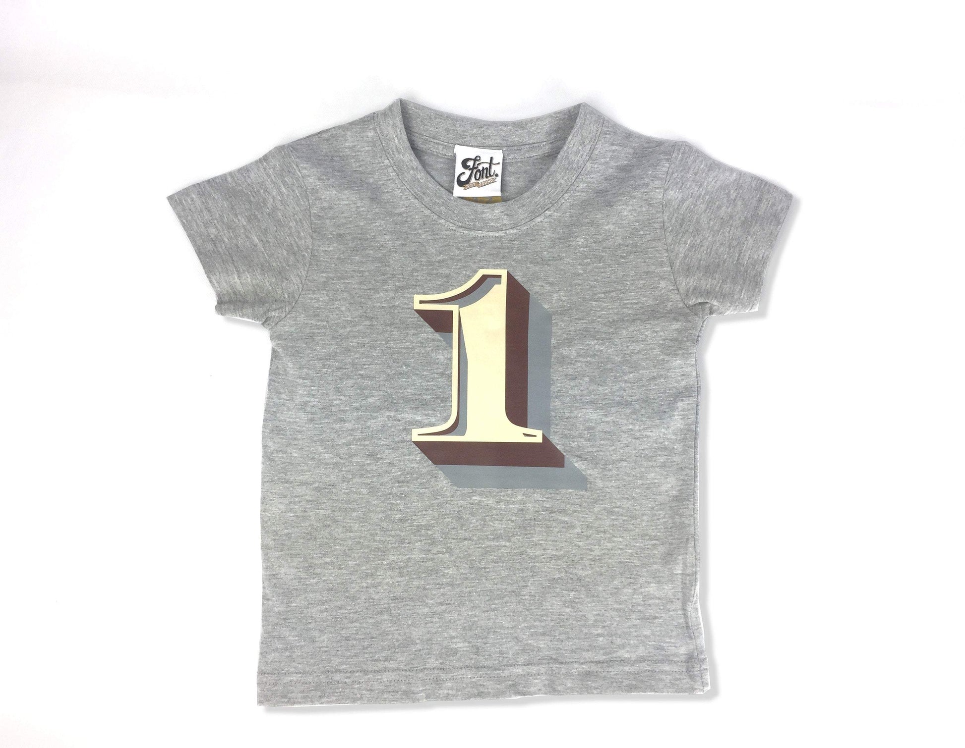 First Birthday Kids' T-shirt - Stirling Shadow Baby Clothes, Font Not Found, Font: Stirling Shadow, New Baby, T-Shirt: Numbers, T-Shirts 44ideas.co.uk