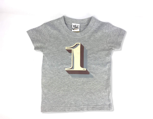 First Birthday Kids' T-shirt - Stirling Shadow Baby Clothes, Font Not Found, Font: Stirling Shadow, New Baby, T-Shirt: Numbers, T-Shirts 44ideas.co.uk