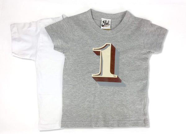 First Birthday Kids' T-shirt - Stirling Shadow Baby Clothes, Font Not Found, Font: Stirling Shadow, New Baby, T-Shirt: Numbers, T-Shirts 44ideas.co.uk