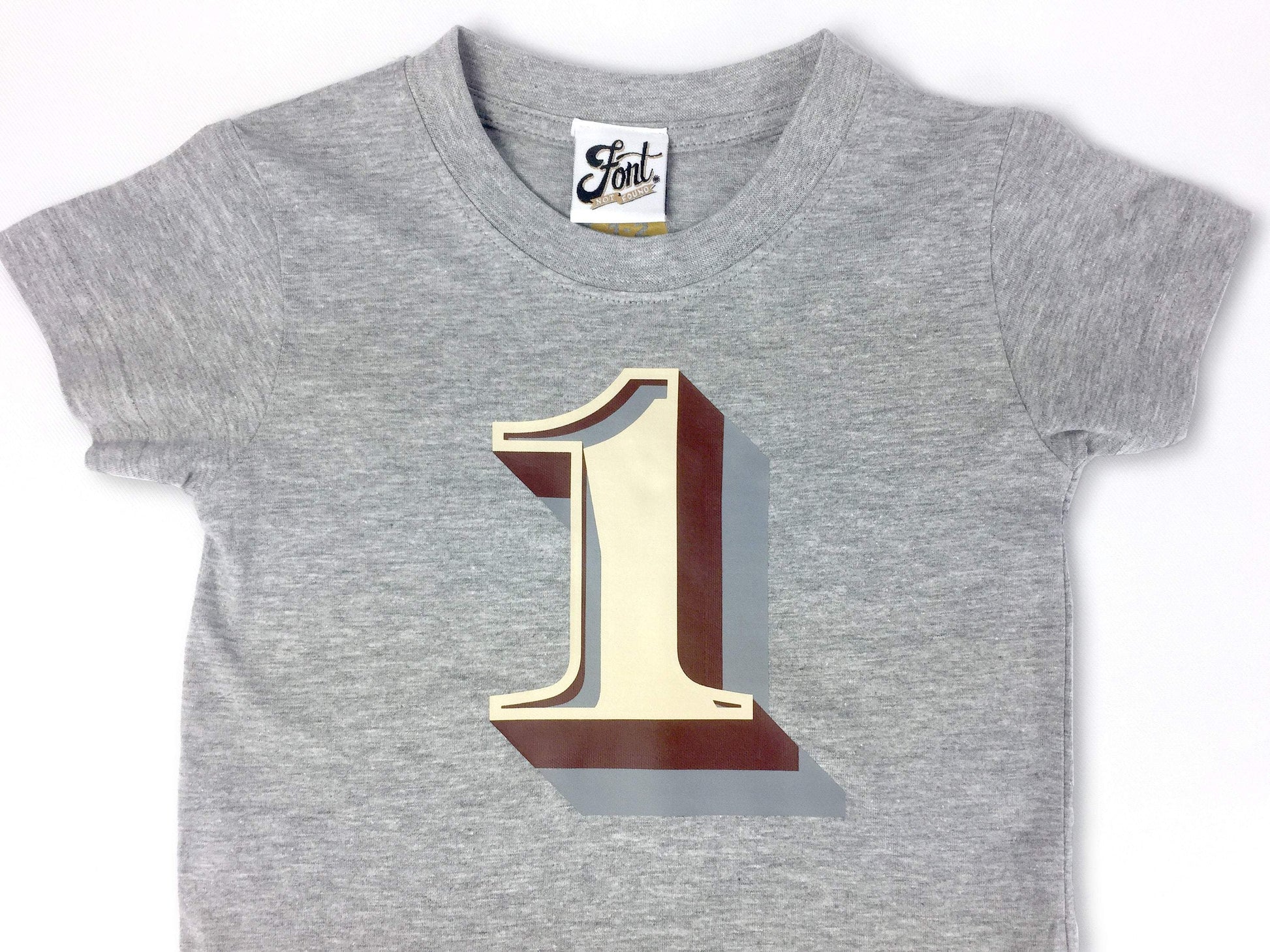 First Birthday Kids' T-shirt - Stirling Shadow Baby Clothes, Font Not Found, Font: Stirling Shadow, New Baby, T-Shirt: Numbers, T-Shirts 44ideas.co.uk